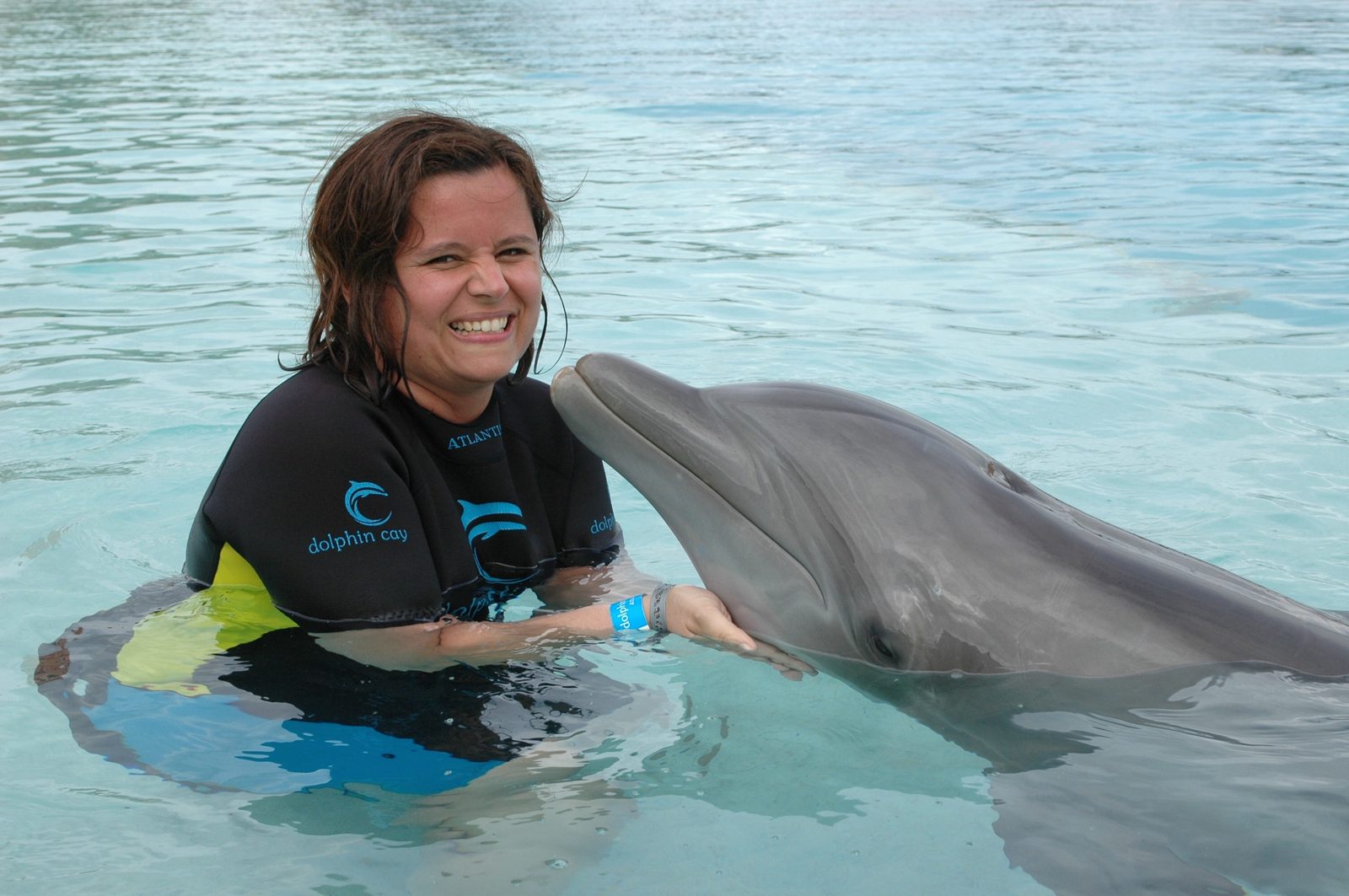 Kathy nose to nose with a dolphin