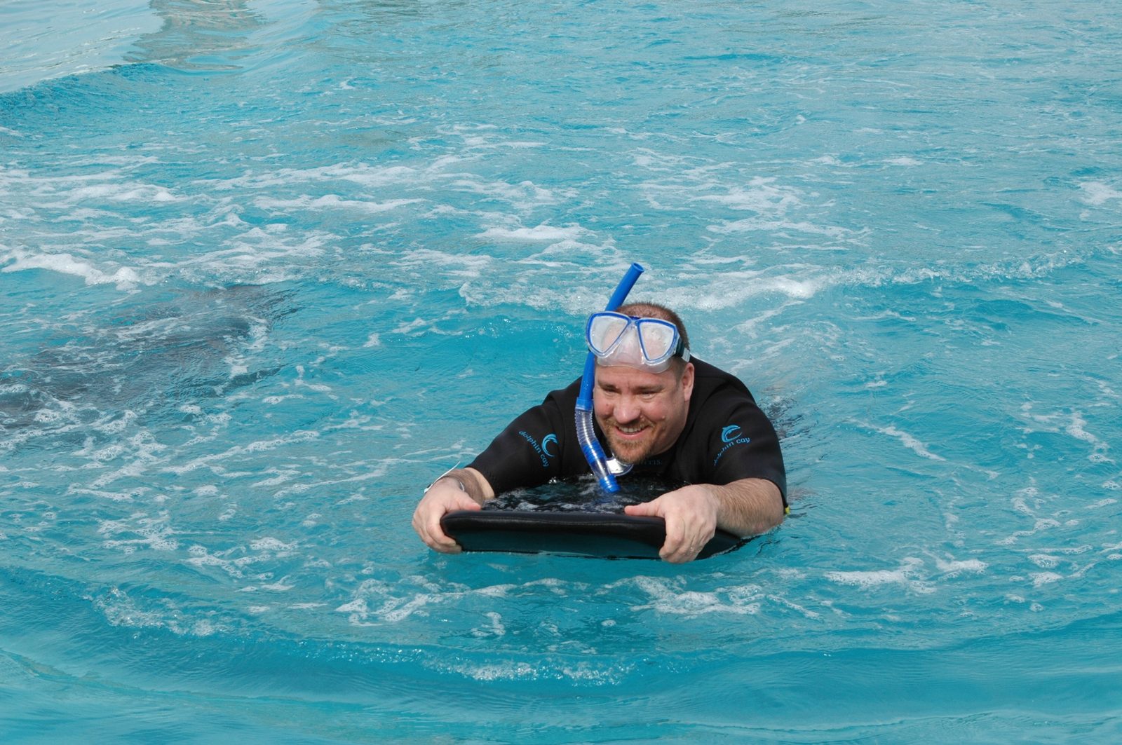 Michael on the bodyboard at Dolphin Cay