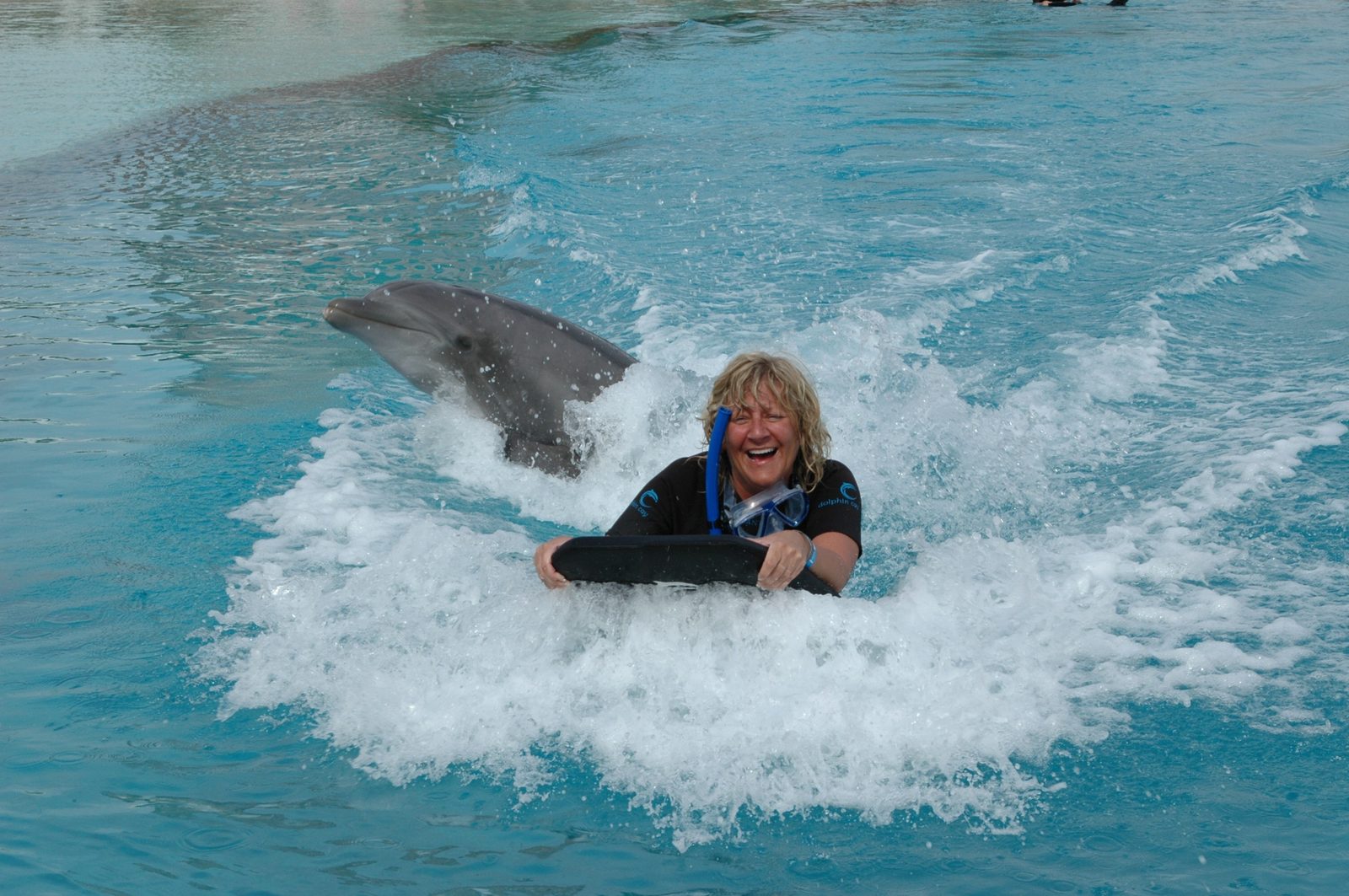 Our neighbor Lisa on the bodyboard as the dolphin bailed early