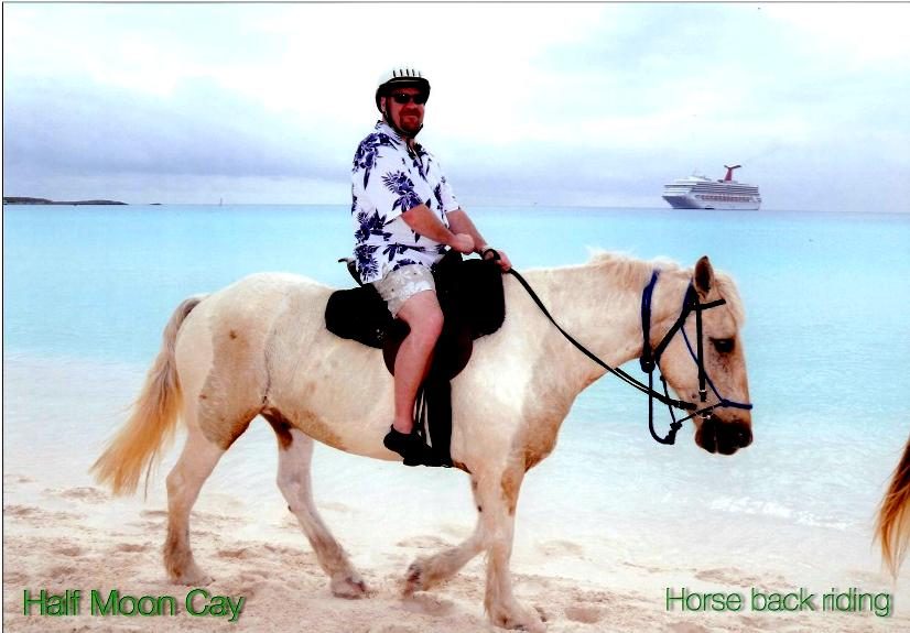 Michael on horseback on the beach at Half Moon Cay