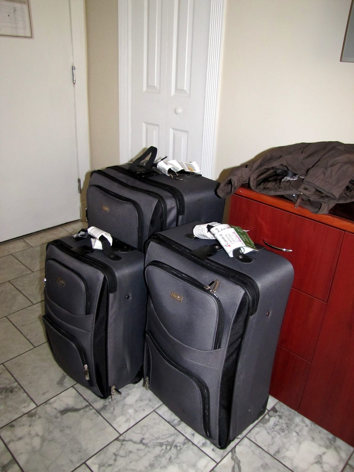 Suitcases packed in our South Beach hotel room, ready for the ship