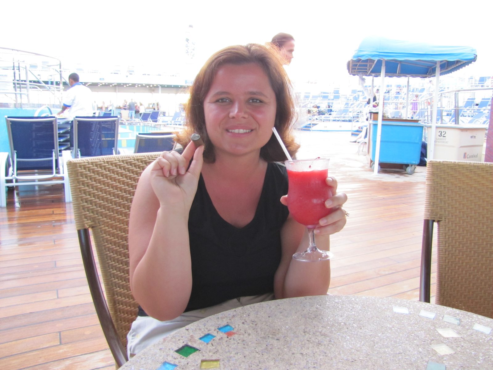 Kathy with a strawberry daquiri and a cigar