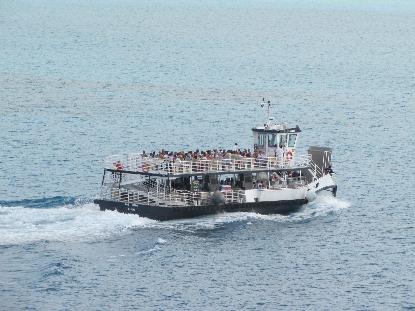 The tender ferry crossing to the island