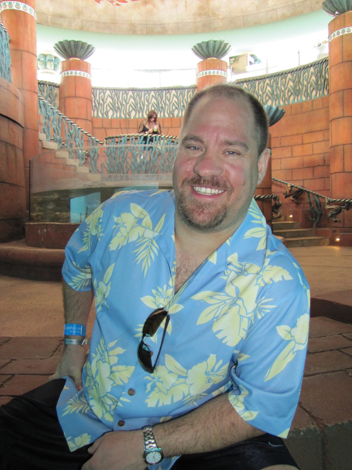 Michael sitting in the big stone seat at Atlantis