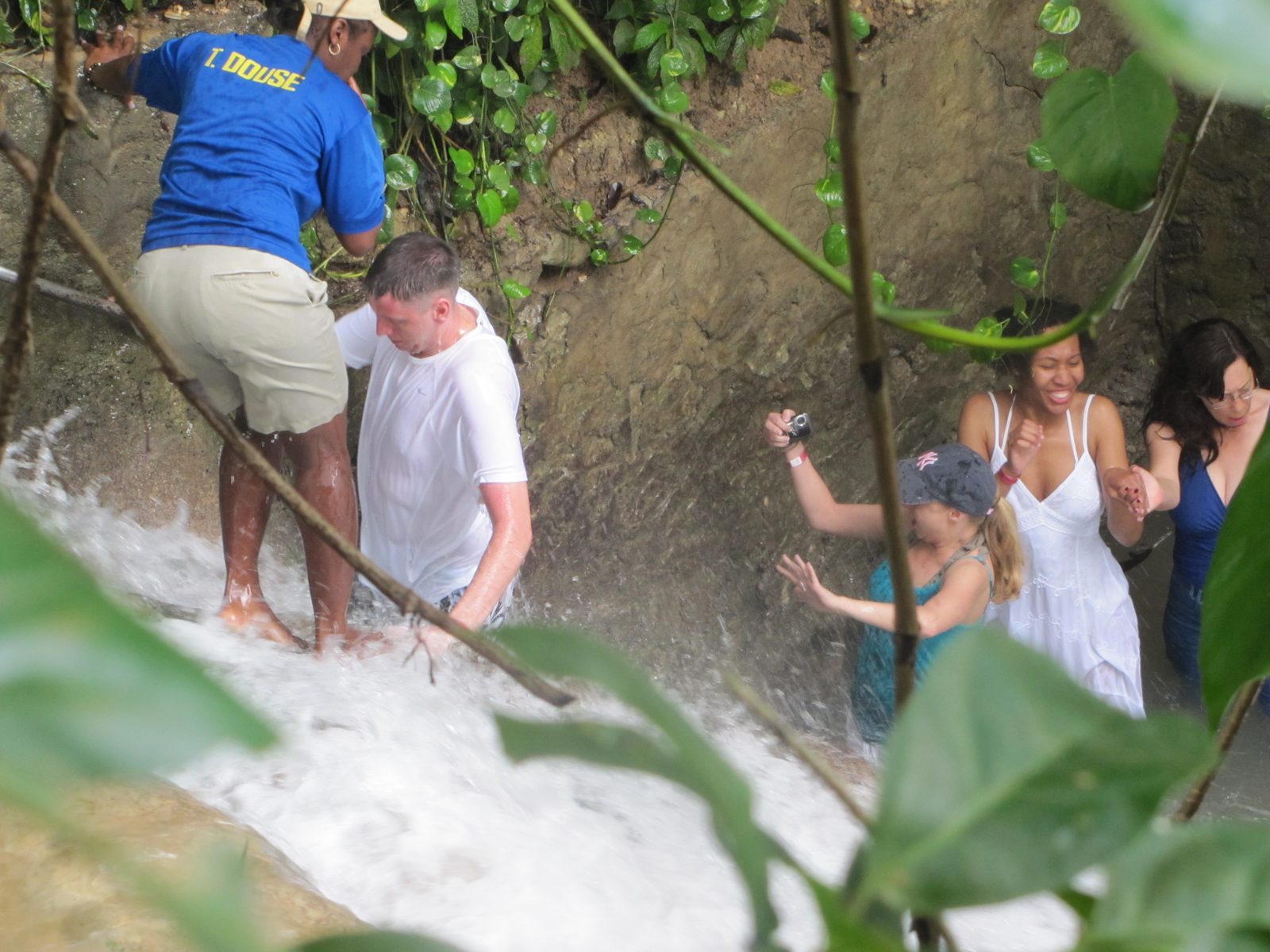 Our guide helps everyone up the falls