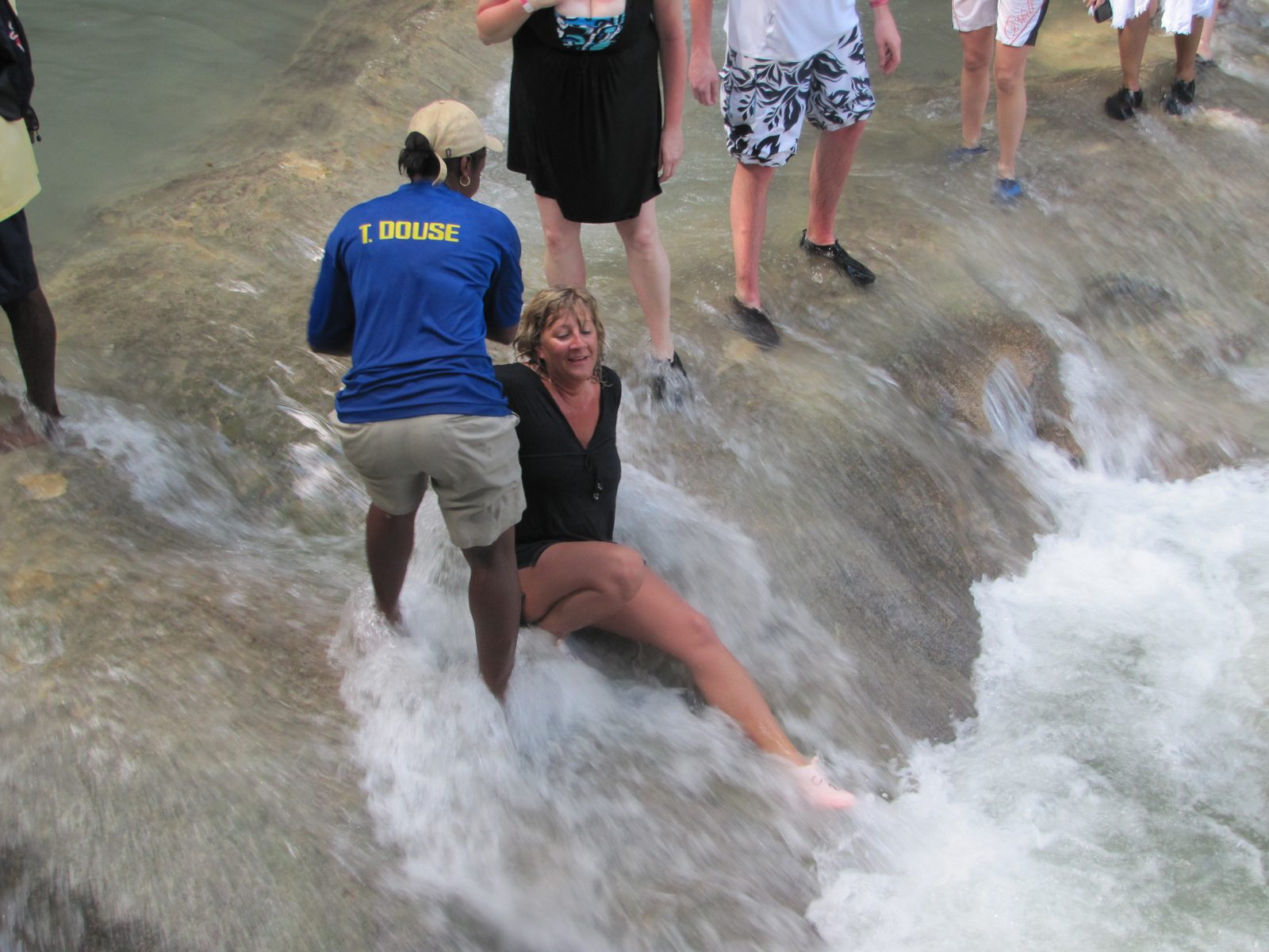Our neighbor Lisa getting dunked at Dunn's River Falls