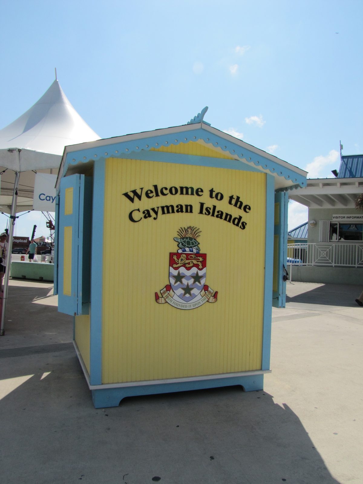 The Welcome to the Cayman Islands sign on the pier