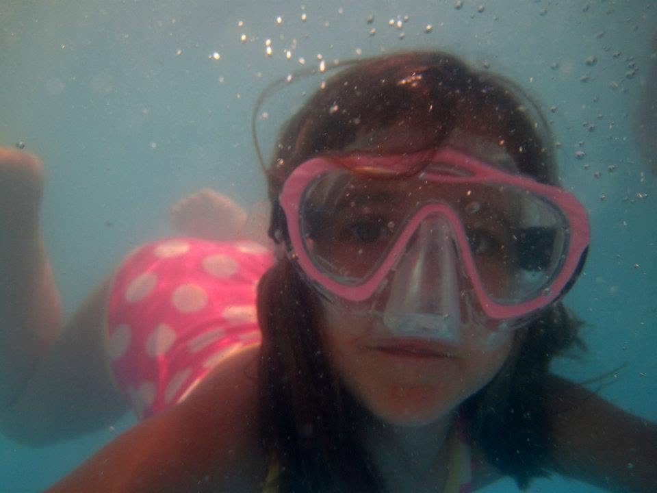 Lisa in her pink diving mask in the ship's pool