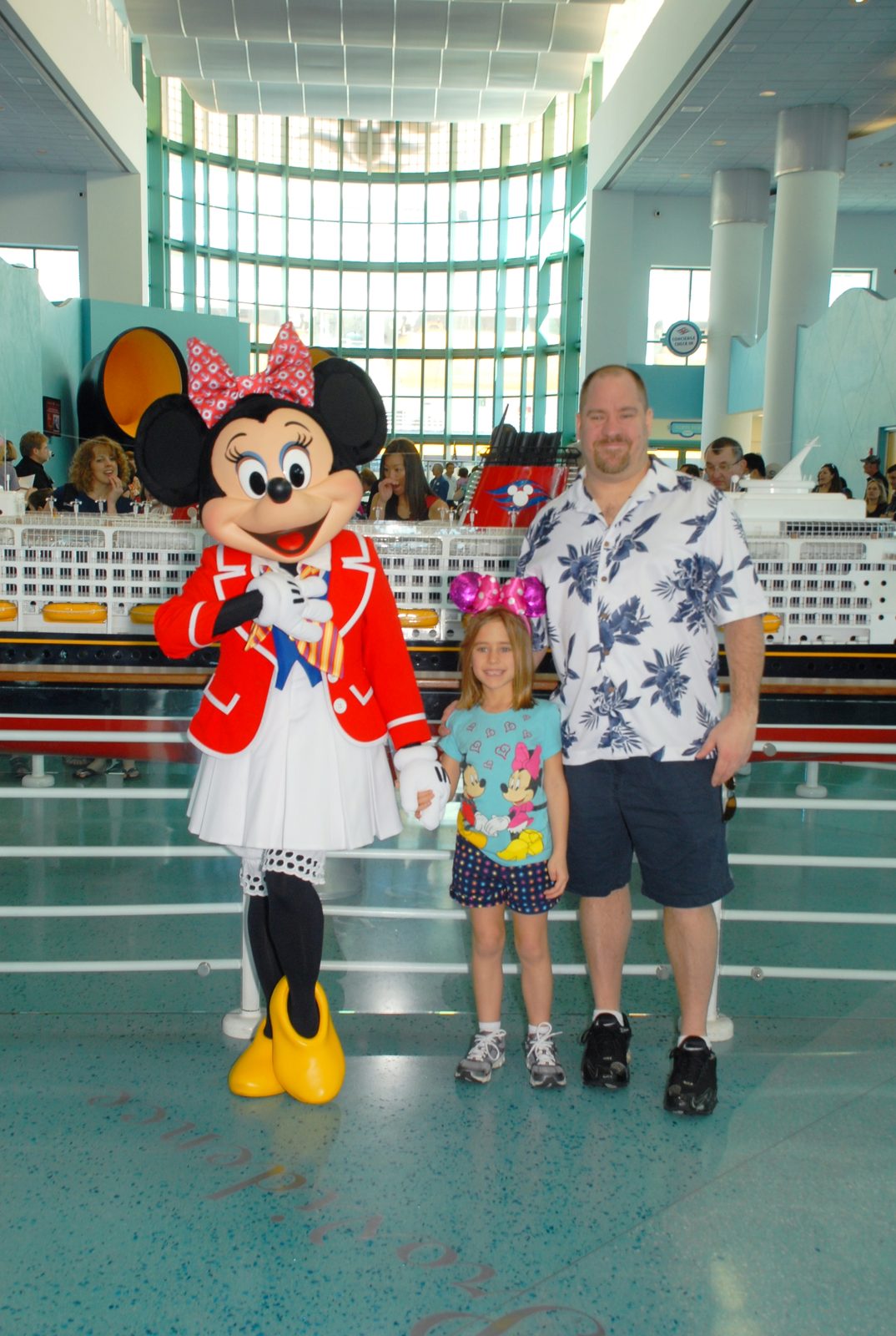 Minnie in her sailor outfit, Lisa and Michael in the Port Canaveral cruise terminal