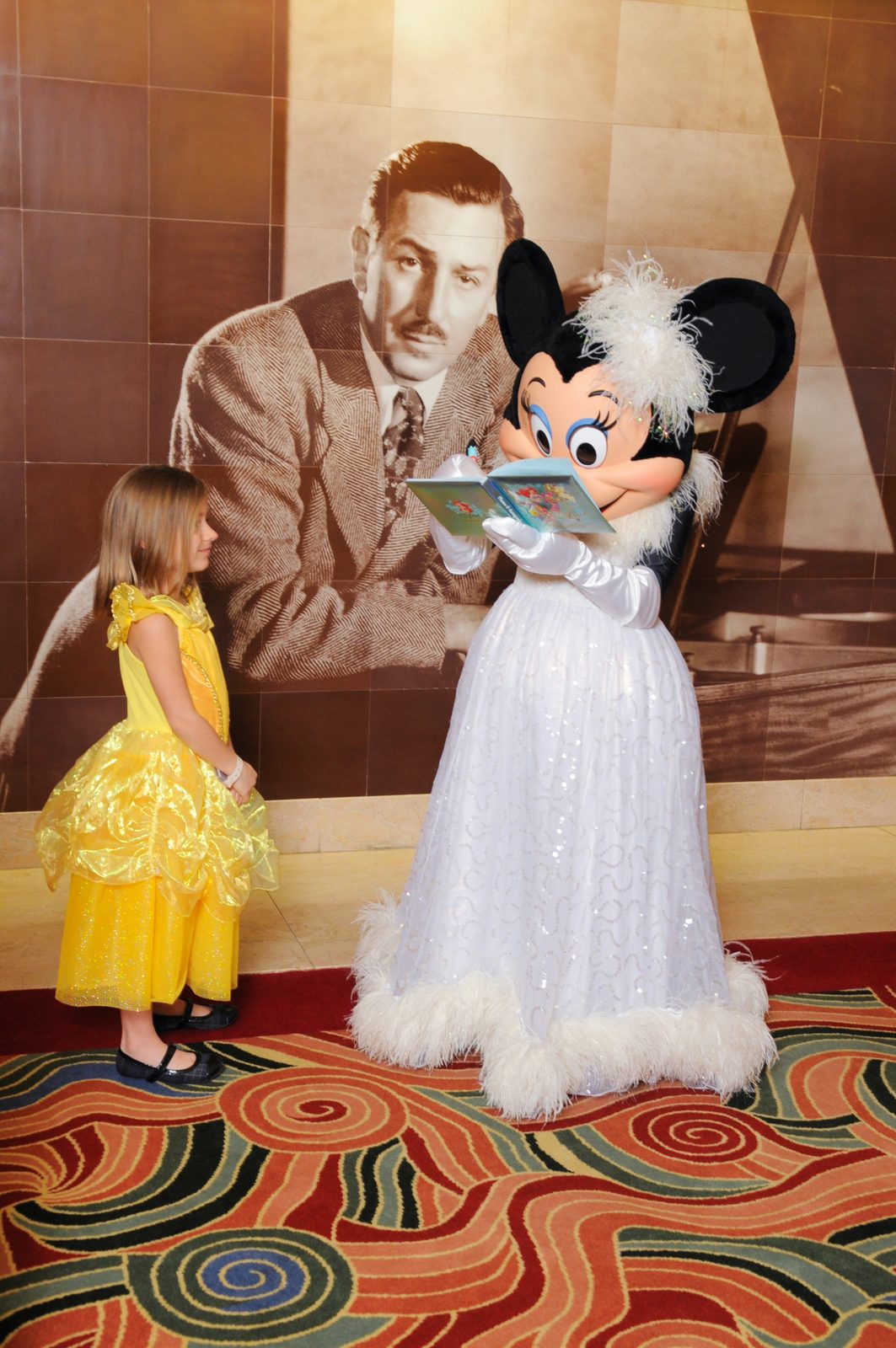 Lisa with Minnie in her formal gown on Formal Night in the Lobby Atrium