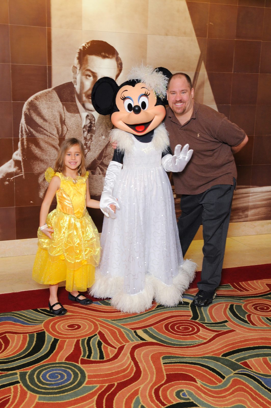 Lisa, Minnie in her formal gown, and Michael on Formal Night in the Lobby Atrium