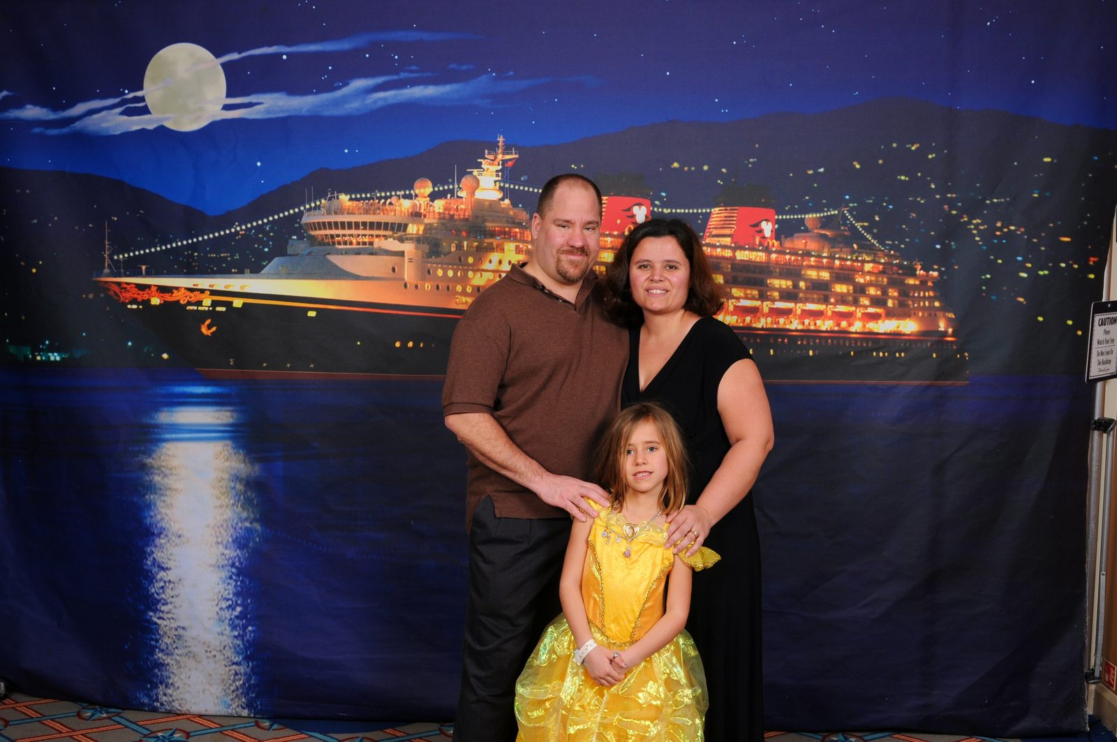 Formal Night portrait against a painted ship backdrop