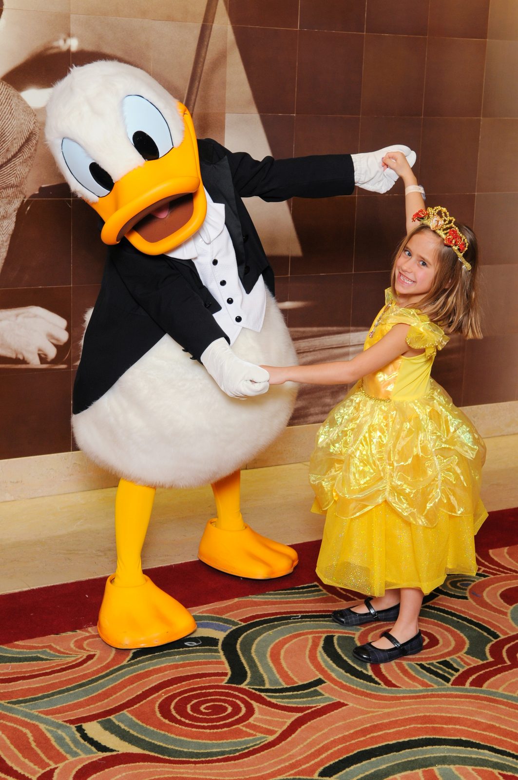 Donald in his tuxedo dancing with Lisa on Formal Night in the Lobby Atrium