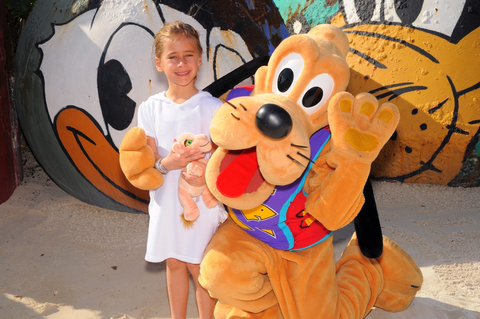 Lisa with Pluto in his island outfit at Castaway Cay