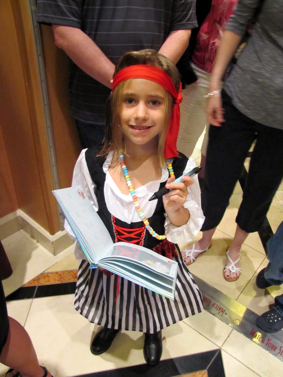 Lisa the pirate with her autograph book