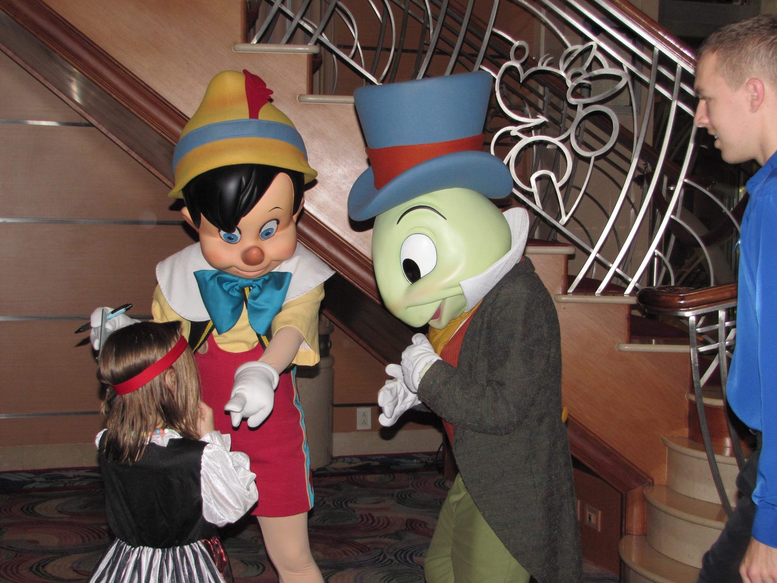 Lisa with Pinocchio and Jiminy Cricket in the Lobby Atrium