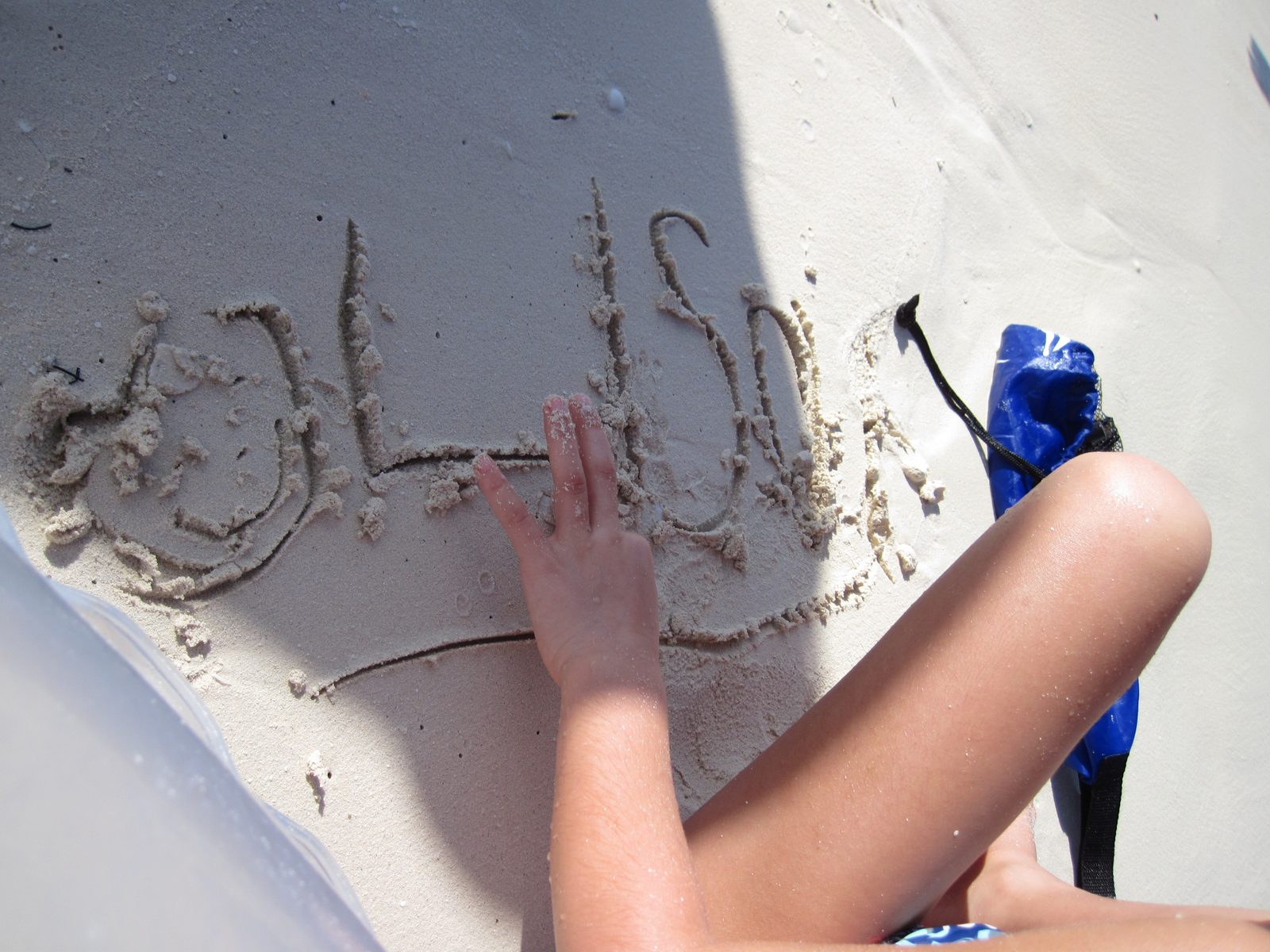 Lisa's name written in the sand on Castaway Cay