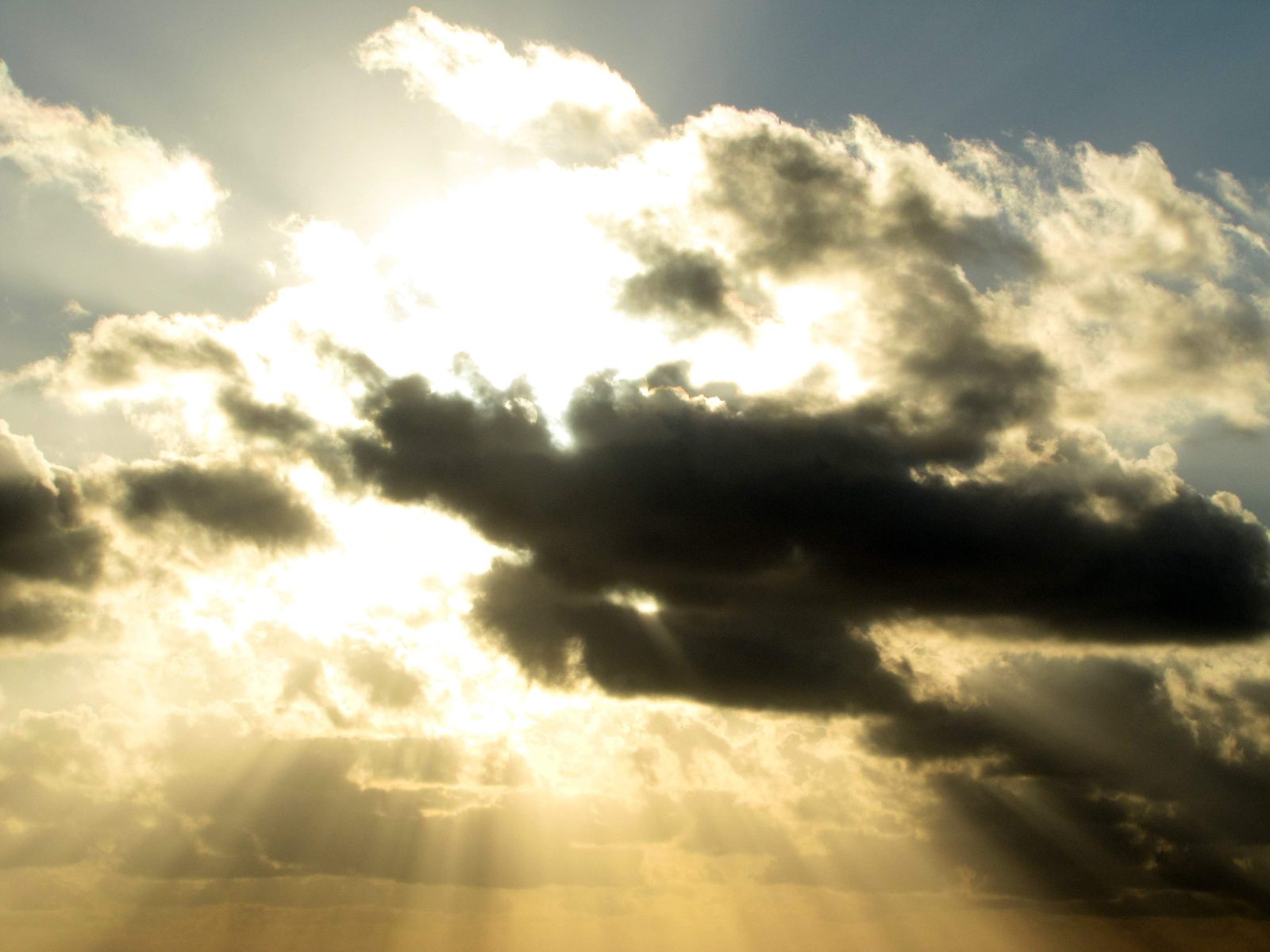 Sun breaking through the clouds from the Magic