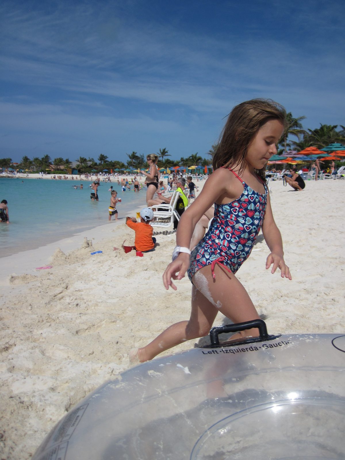 Lisa running down the beach on Castaway Cay
