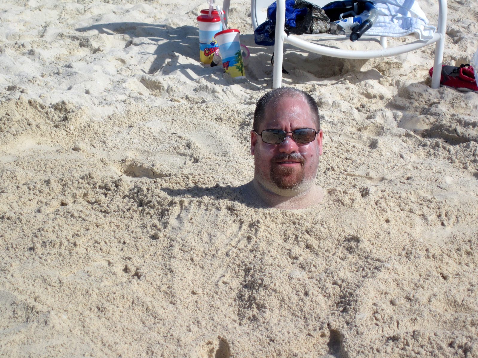 Michael buried up to his neck on Castaway Cay