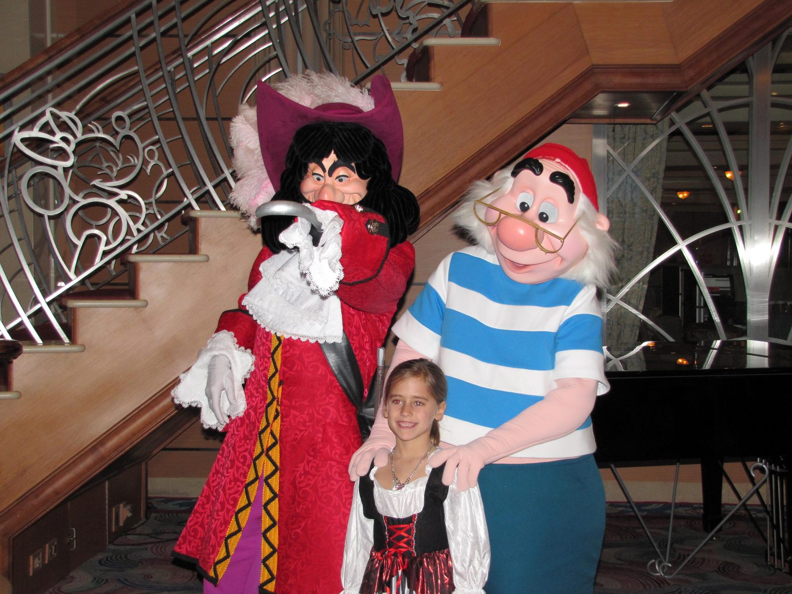 Captain Hook, Lisa and Mr. Smee on Pirate Night in the Lobby Atrium