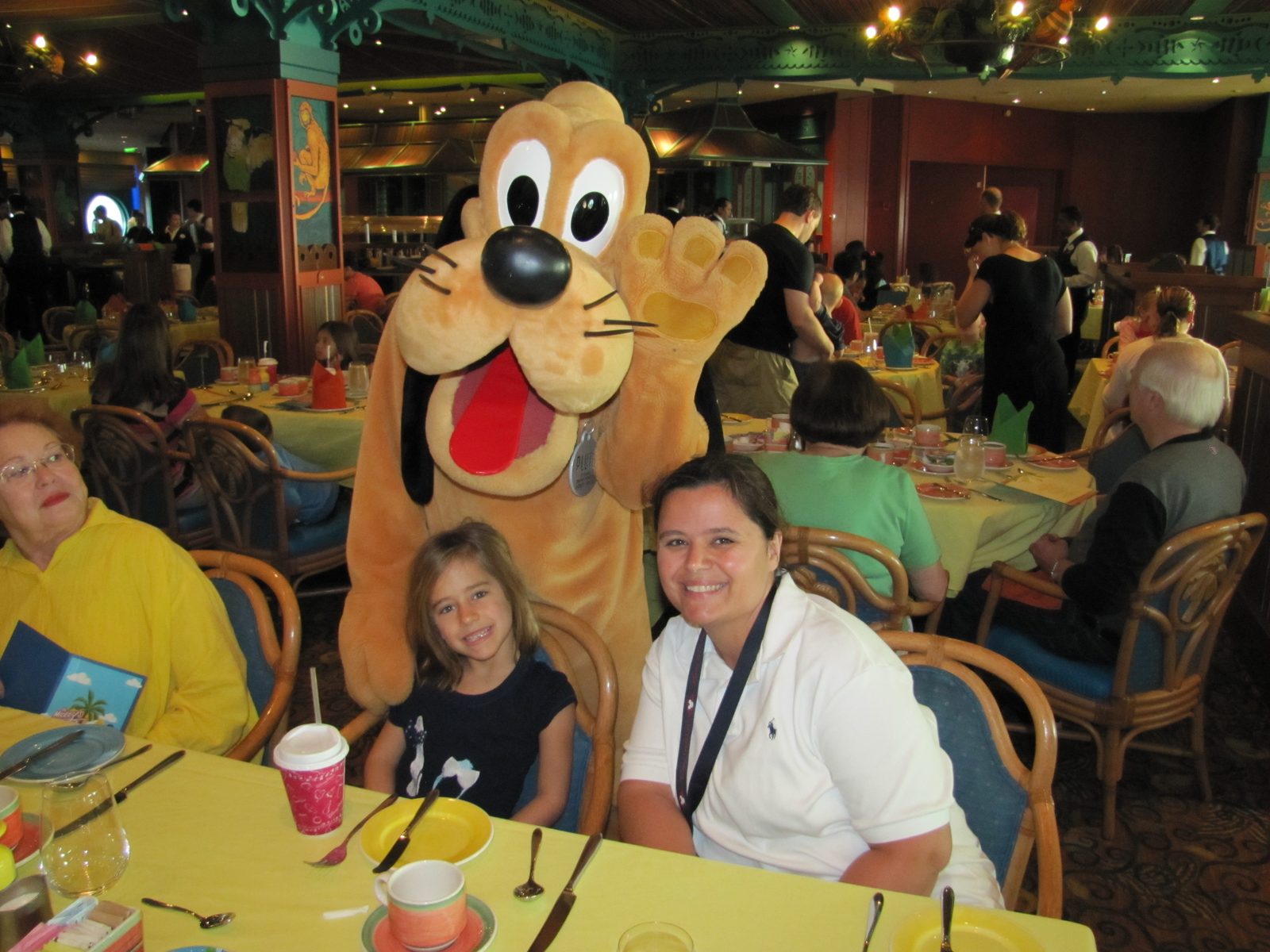 Pluto with Lisa and Kathy at the character breakfast