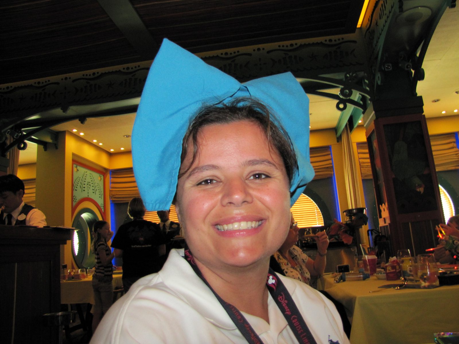 Kathy in her napkin hat at breakfast