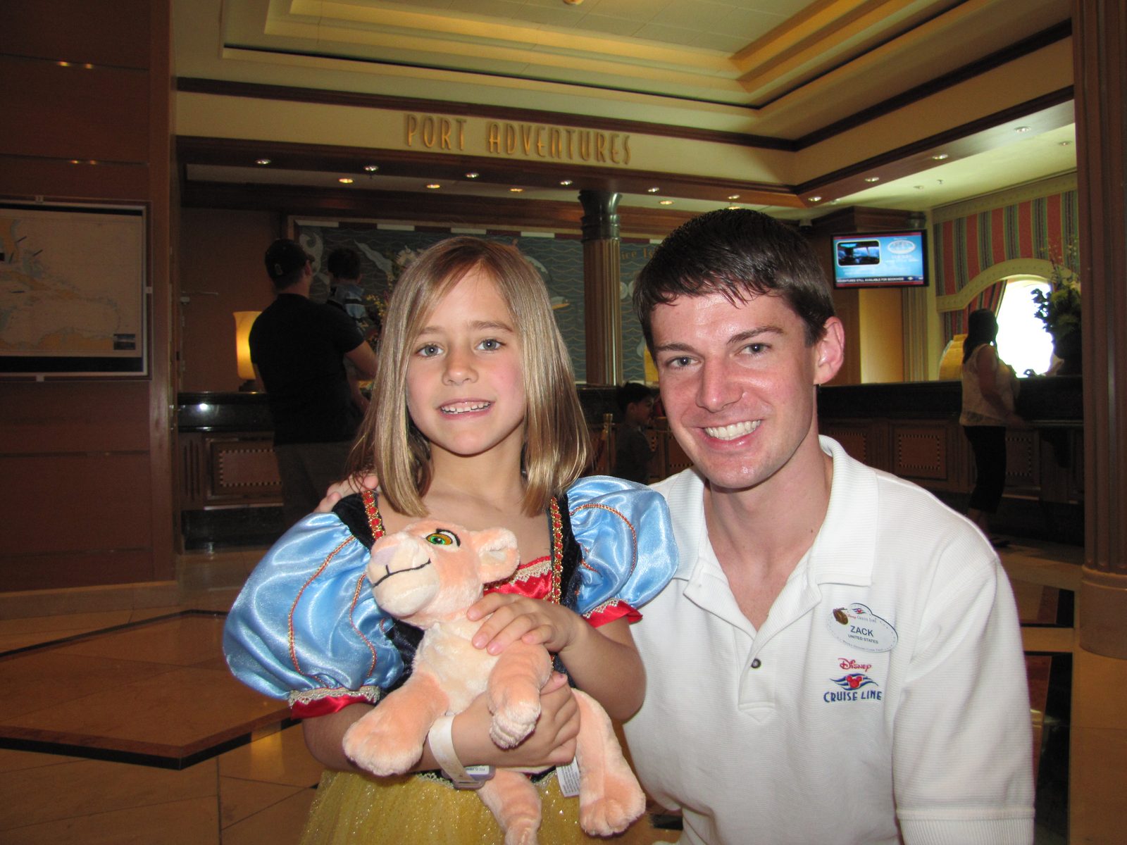 Lisa with Cast Member Zack who kept us company in the princess line