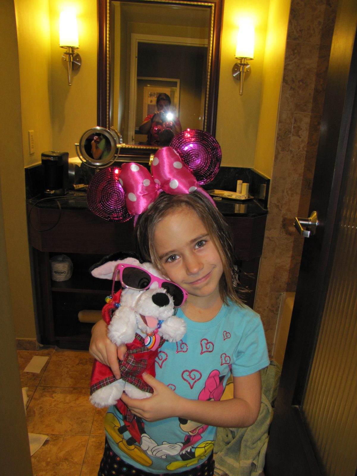 Lisa and her stuffed husky, Bob, at check-in