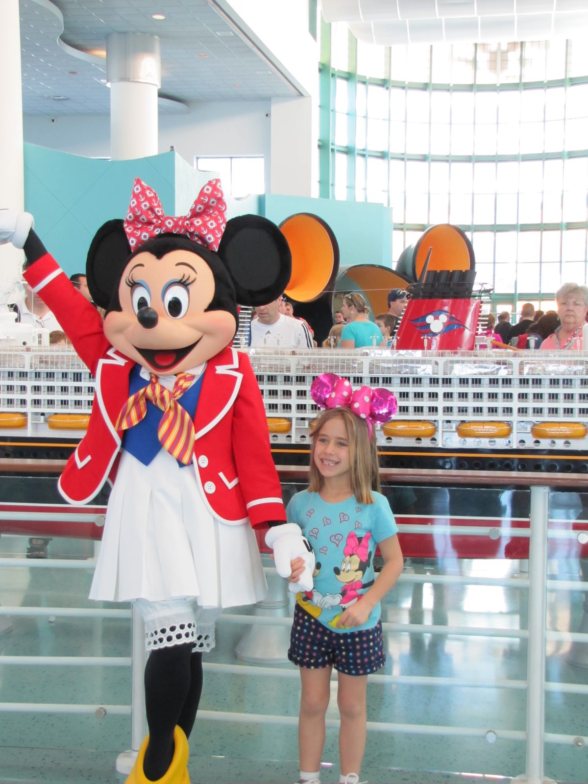 Lisa and Minnie in her sailor outfit in the Port Canaveral cruise terminal