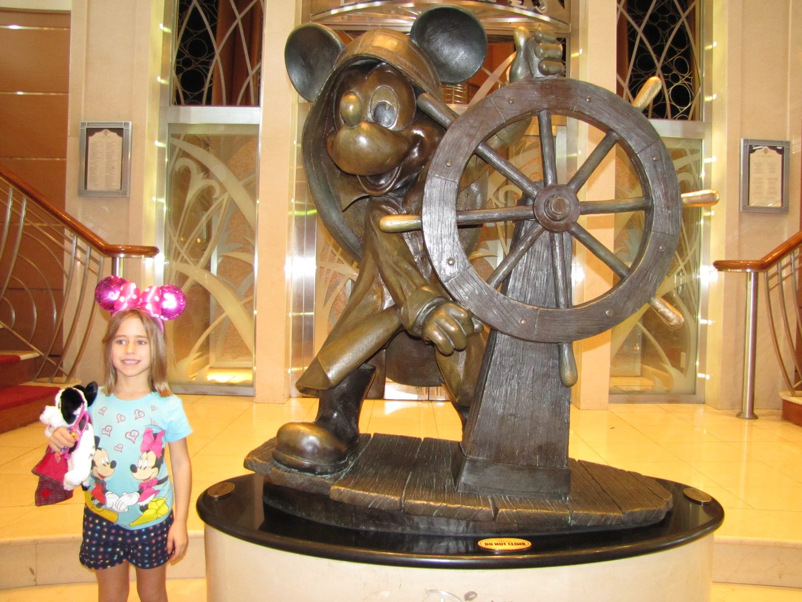 Lisa and helmsman Mickey on the Disney Magic