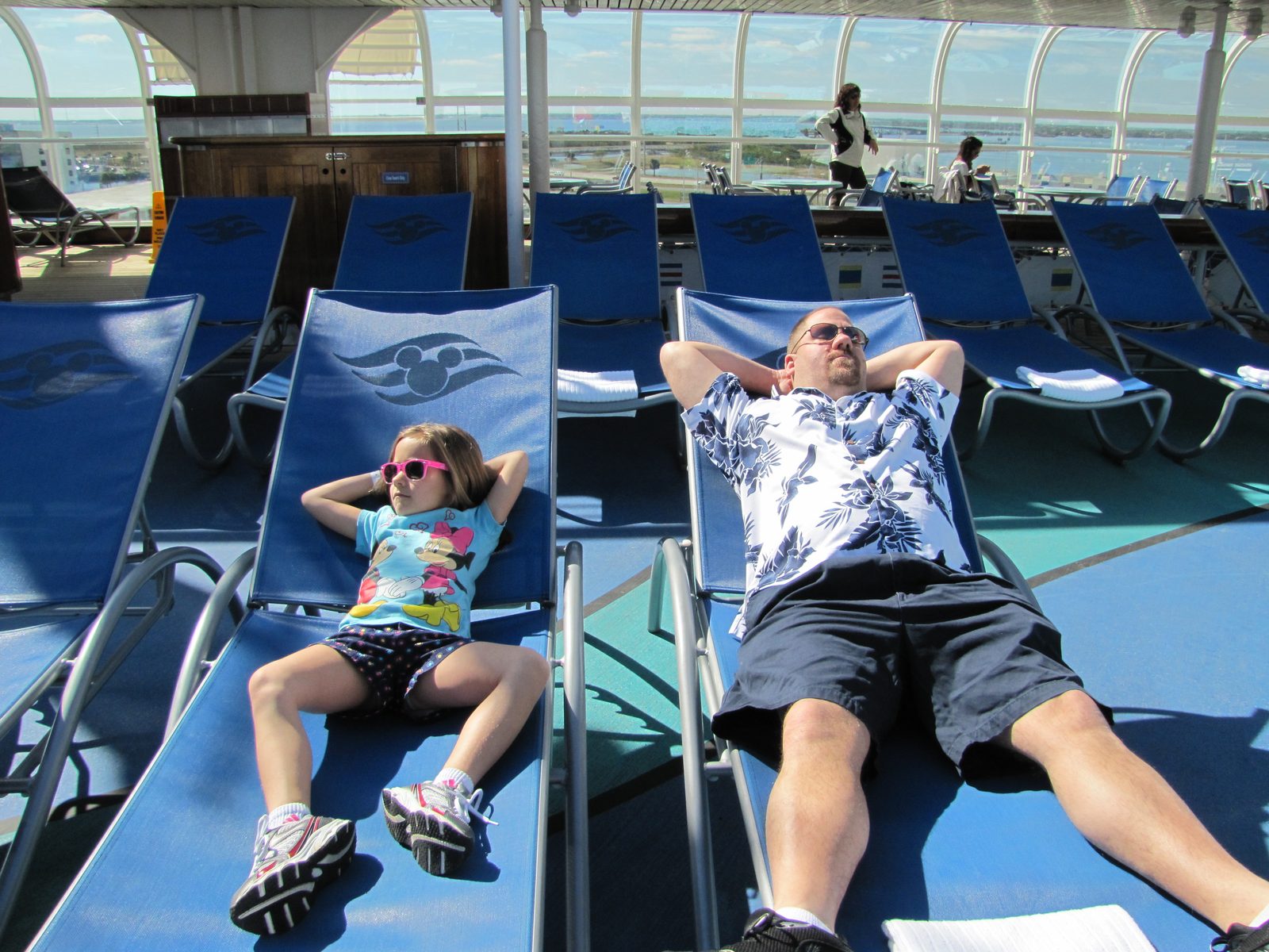 Lisa and Michael stretched out on deck on the Magic