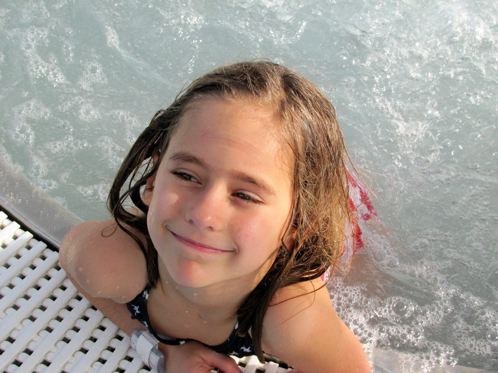 Lisa surfacing in the pool