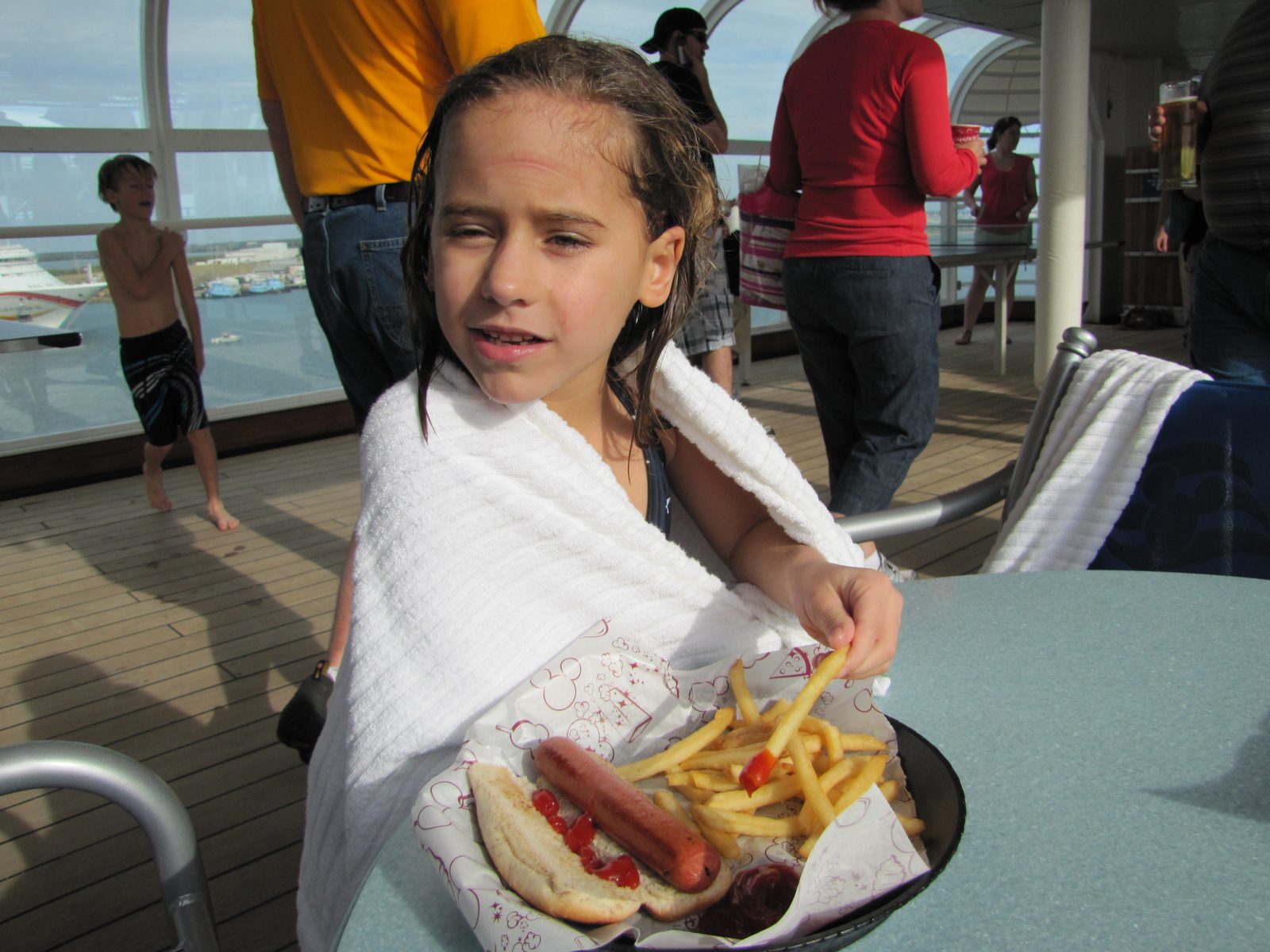 Lisa with a hot dog from Pluto's Dog House