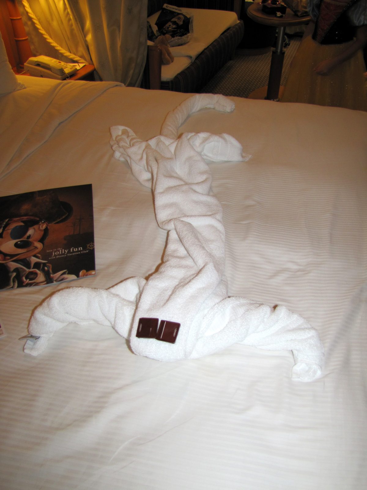 A towel animal waiting on our bed
