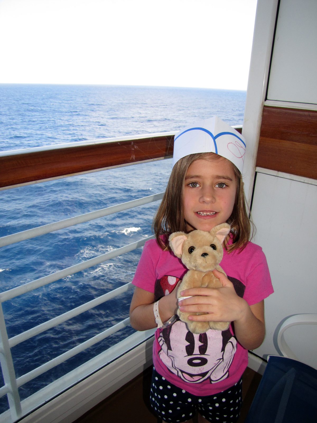 Lisa out on our balcony at sea