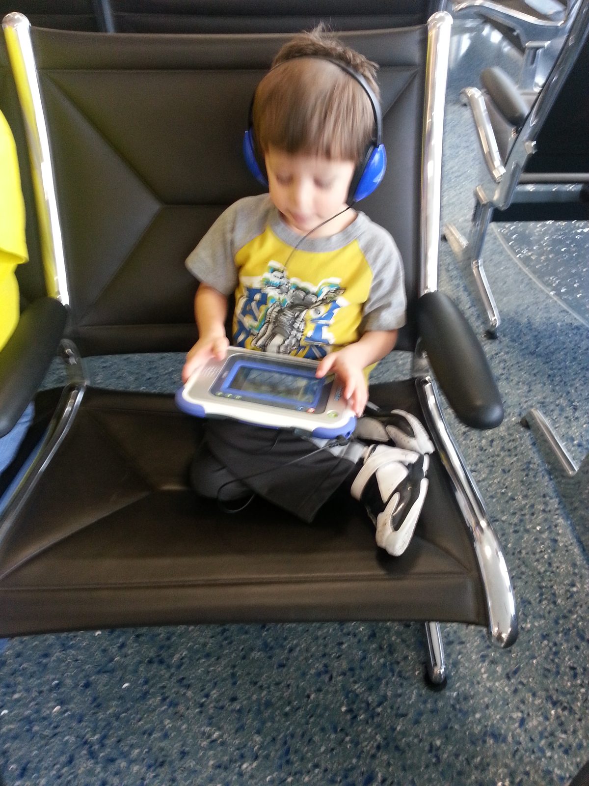 Thomas waiting at the gate with his tablet