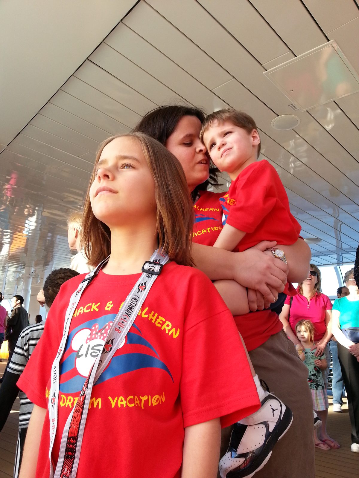 Lisa, with Kathy holding a sleepy Thomas on deck