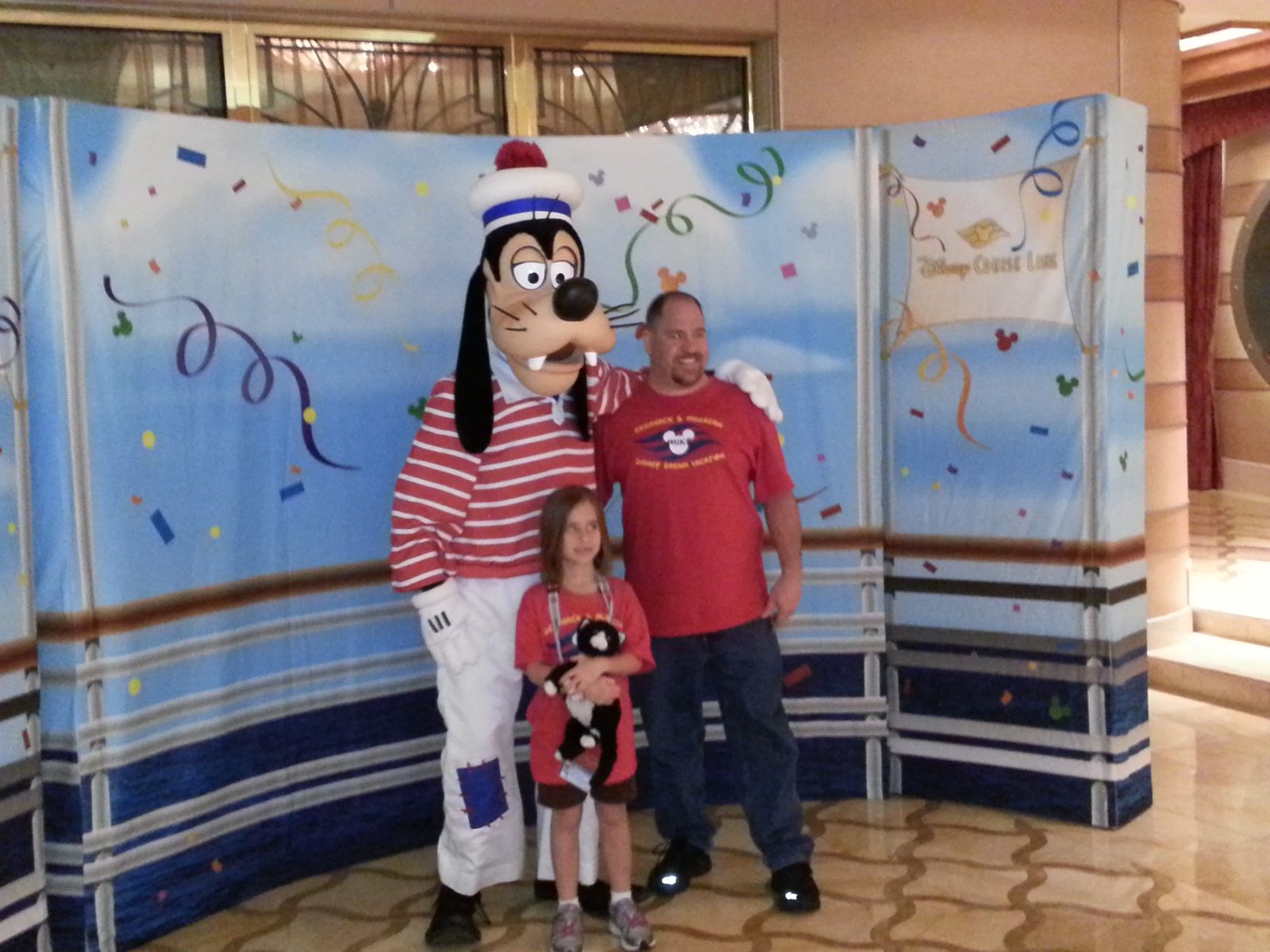 Goofy in his sailor outfit with Lisa and Michael on our first night aboard