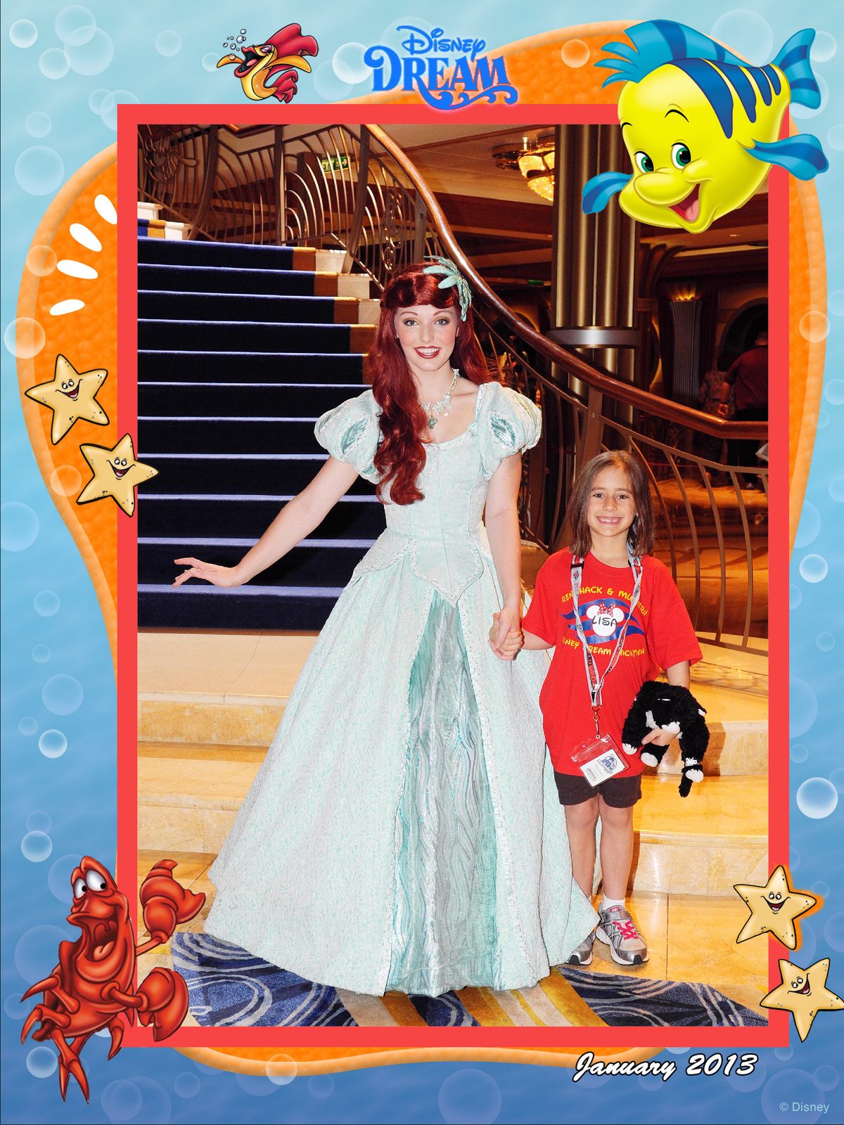 Lisa with Ariel on the grand staircase in the Lobby Atrium