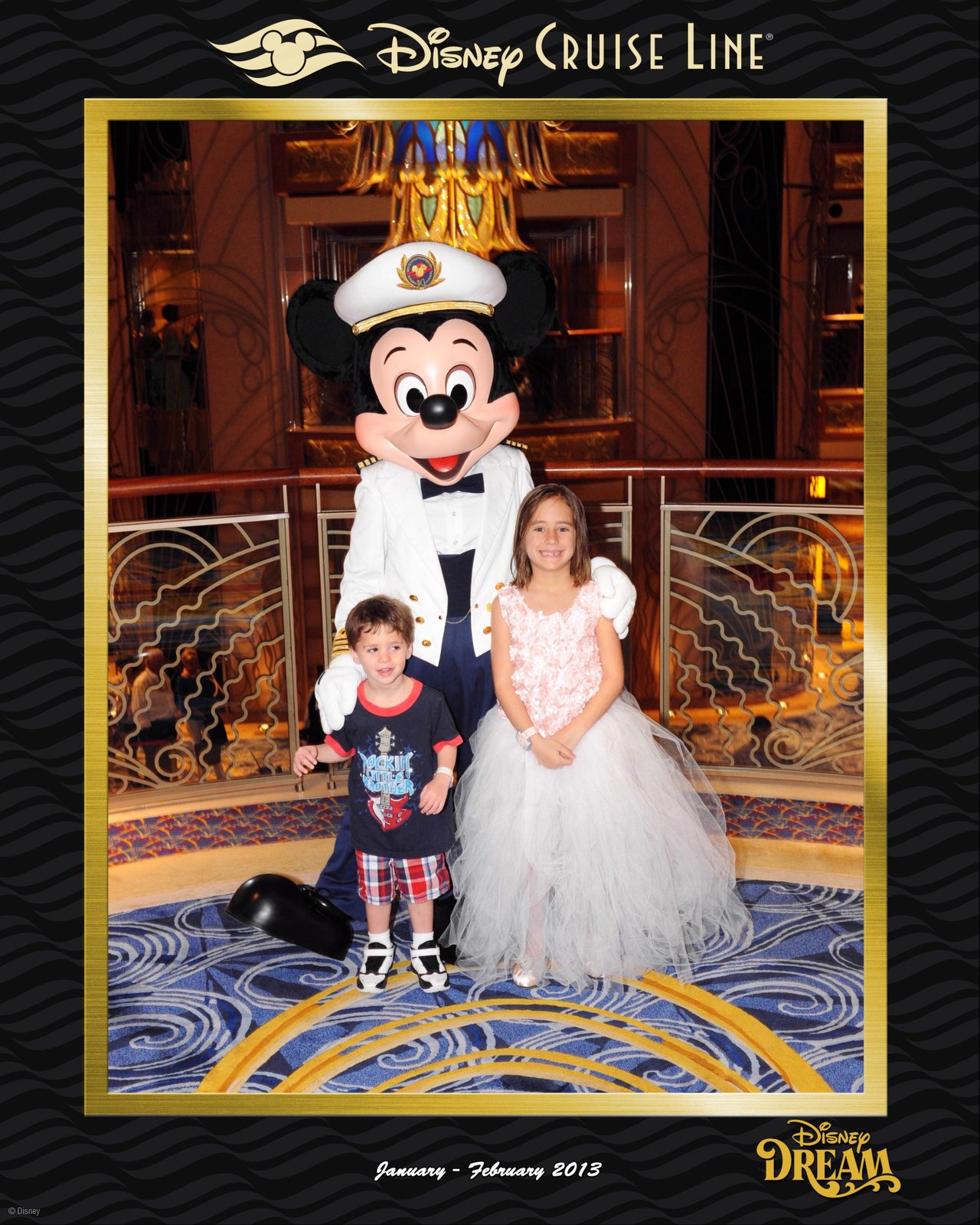A formal portrait with Mickey Mouse