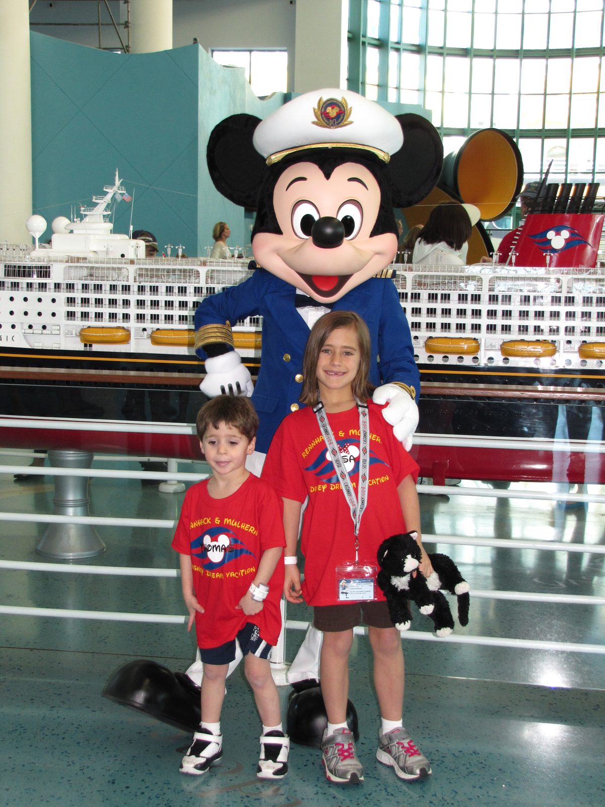 Thomas and Lisa with Captain Mickey in the Port Canaveral terminal