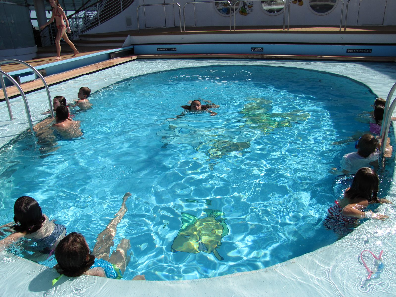 Lisa swimming in Donald's Pool