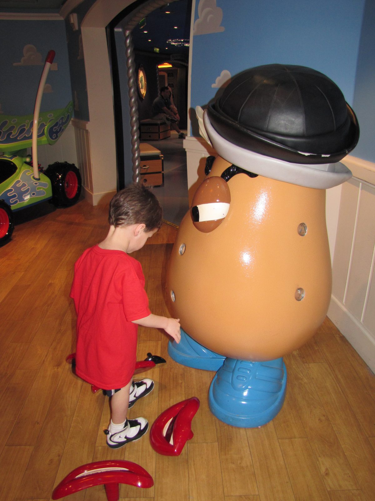 Thomas playing with Mr. Potato Head