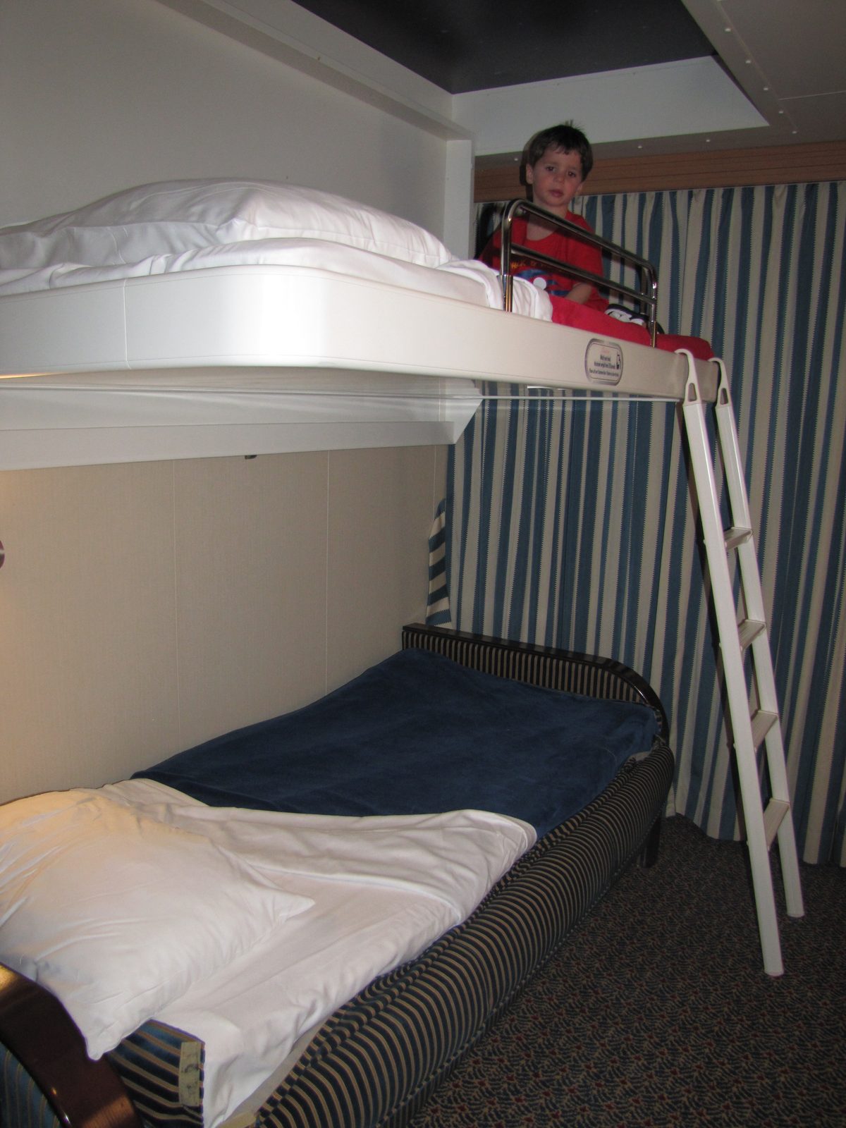 Thomas up on the stateroom bunk