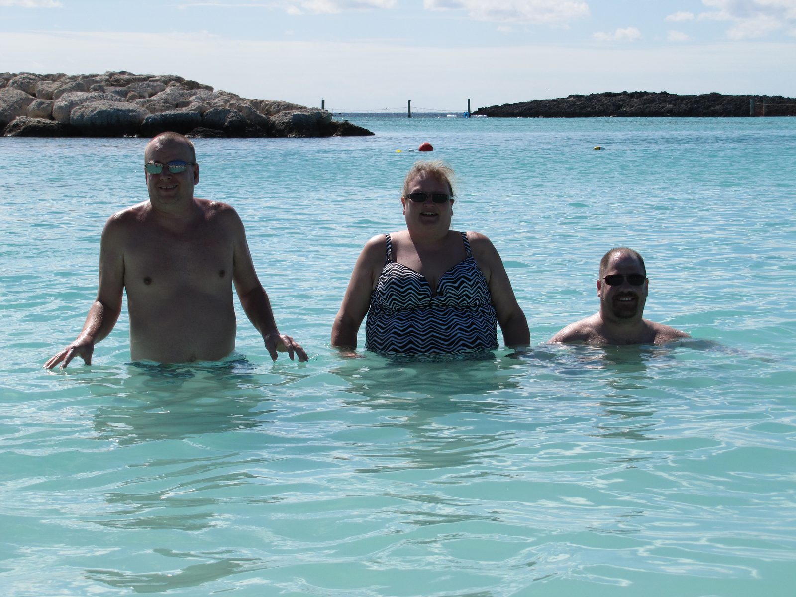 Dan, Kim and Michael in the cold water at Castaway Cay