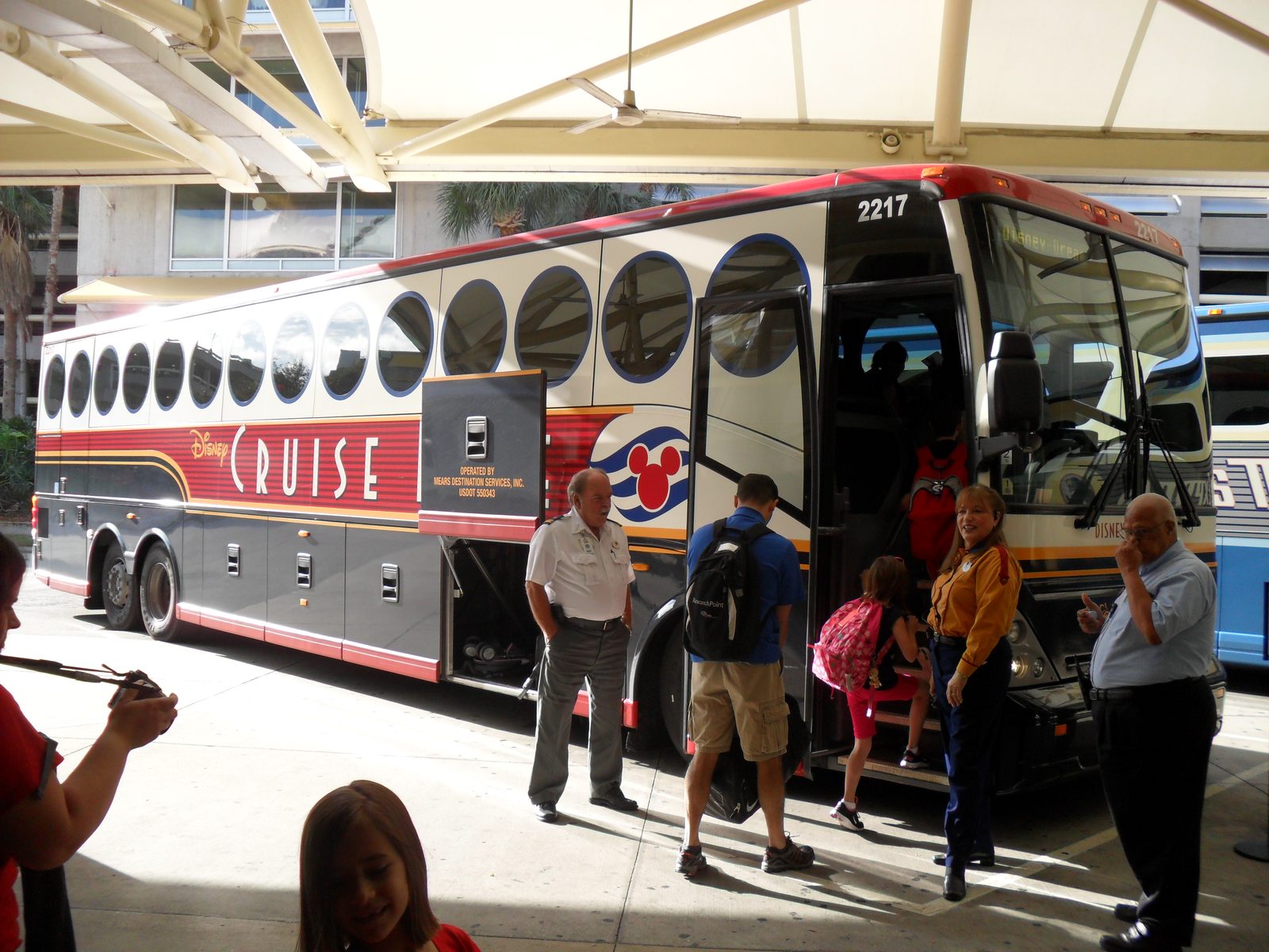 Lisa boarding the motorcoach to Port Canaveral