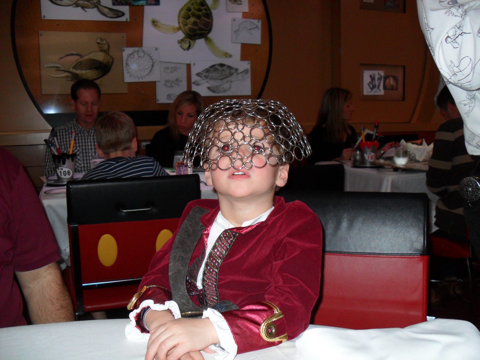 Thomas in pirate dress at dinner
