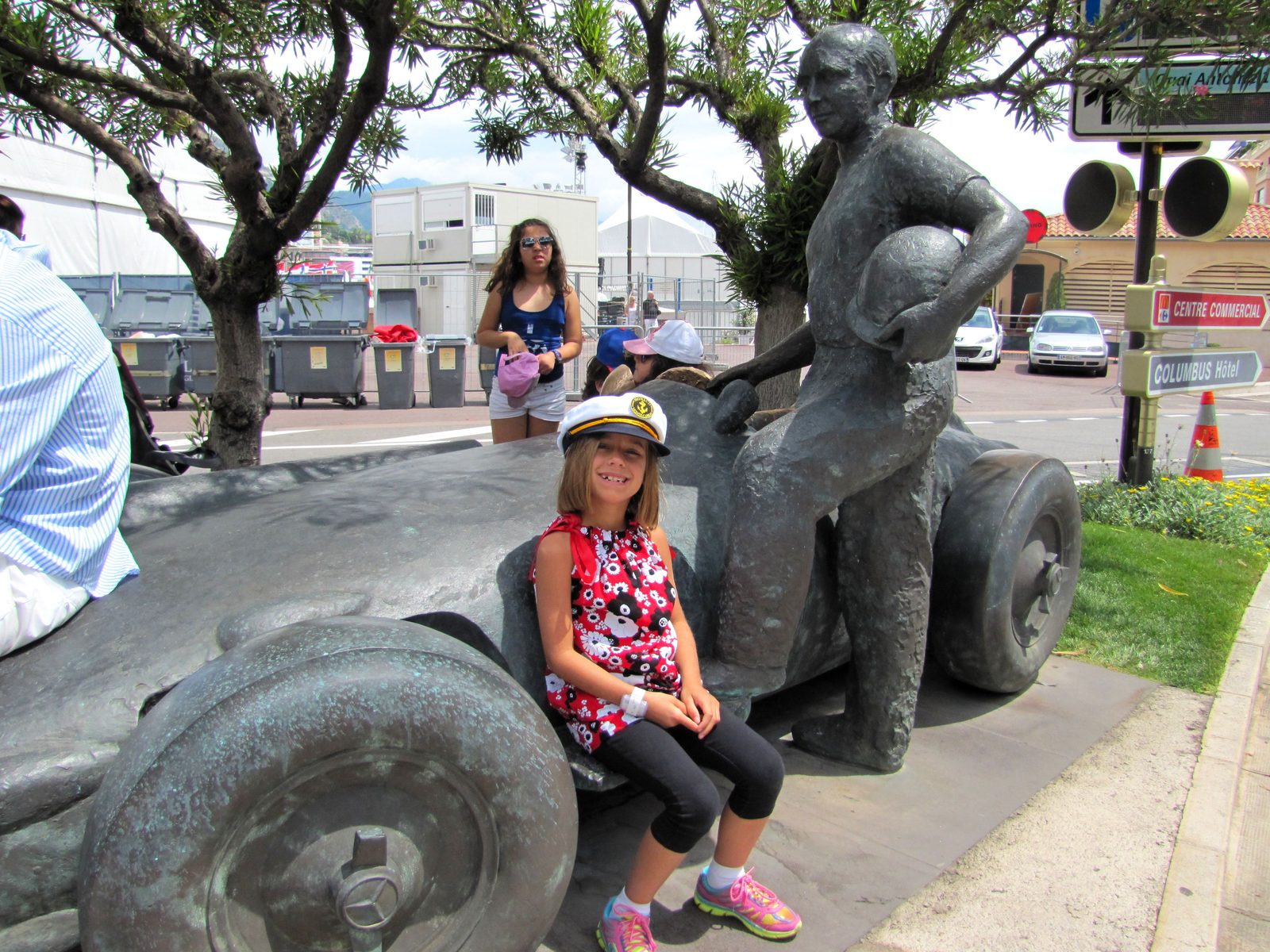 Lisa waiting with a giant sculpture before our transfer