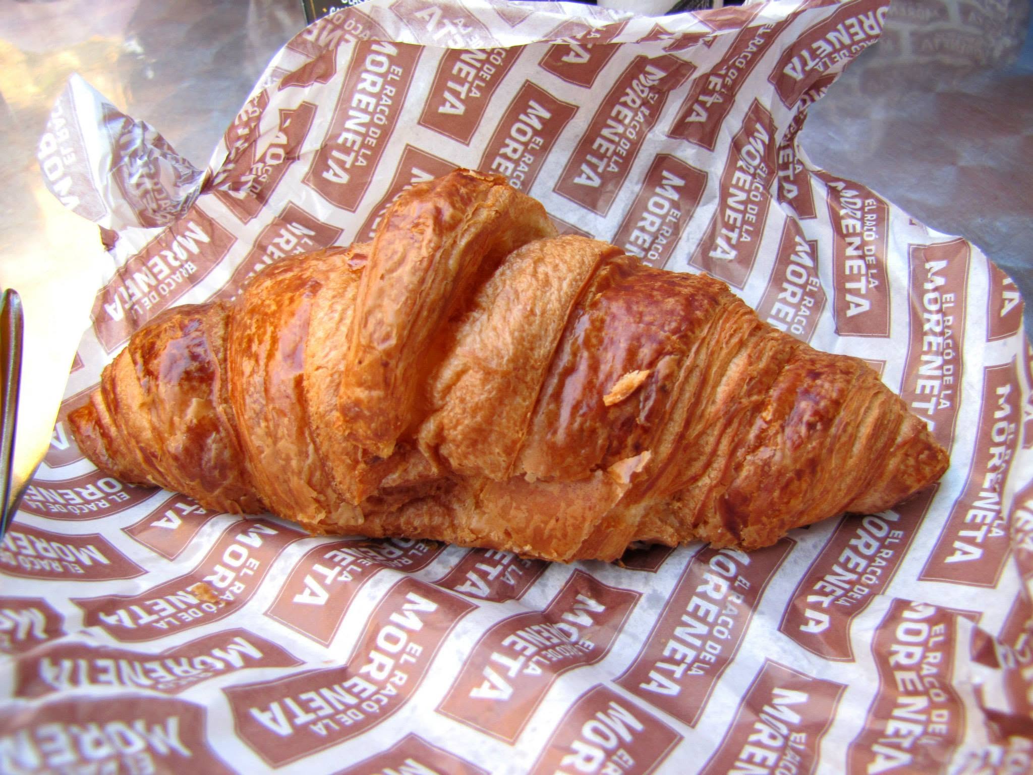 Kathy's first of many croissants in Barcelona
